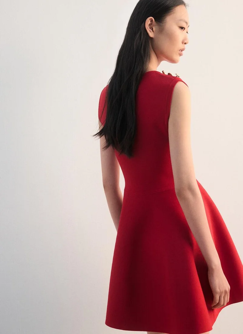 مانجو Peplum knit dress with buttons